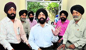 Riot affected families interact with The Tribune team in Jalandhar.