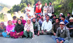 Villagers stage a protest in Doda on Friday. A Tribune photograph
