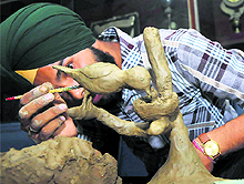 A student models clay during the Inter-College Youth Festival of Punjab Agricultural University in Ludhiana