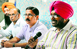 GLADA officials conduct an auction in Ludhiana on Friday