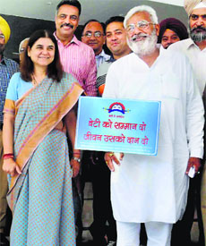 Union Minister Maneka Gandhi and Punjab Health Minister Surjit Kumar Jayani at a function in Chandigarh on Friday.