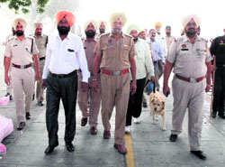 A railway police party patrol during the bandh call at the Bathinda railway station on Saturday.