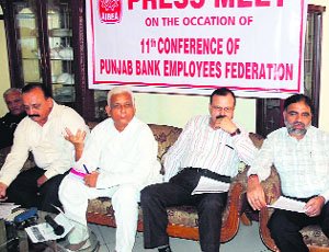Office-bearers of the Punjab Bank Employees Federation during a conference in Bathinda on Saturday.