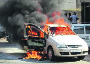 The car that caught fire in Dera Bassi.