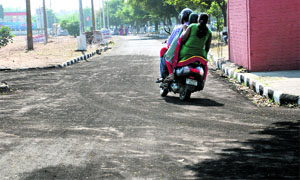 A patch on the road that has been re-carpeted near Shalimar Mall in Panchkula on Saturday.