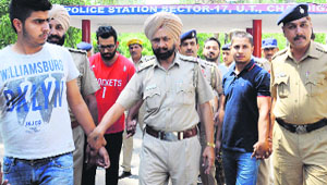 A file photo of the accused in police custody.