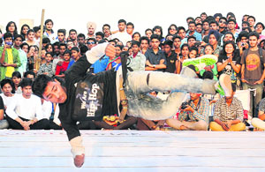 A student performs during a street dance competition at the PECFest on the PEC University of Technology campus in Chandigarh on Saturday.