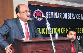 A representative of the Institutes of Chartered Accountants of India addresses a seminar on the issue of service tax in Jalandhar on Saturday.