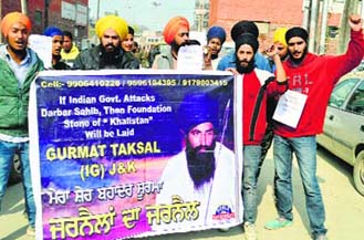 Members of a Sikh outfit protest on the 30th anniversary of 1984 riots, in Srinagar on Saturday.