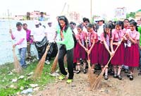 Badminton player PV Sindhu takes part in a cleanliness drive in Hyderabad on Saturday