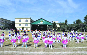 Children perform at the annual sports day of St Judes School in Dehradun on Saturday.