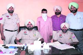 The driver of the truck, containing a huge quantity of alcohol, in police custody in Amritsar