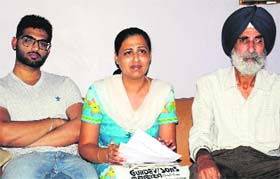 Navninder Kaur breaks down while addressing media persons at her residence in Bathinda on Sunday.