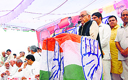 Former Chief Minister Bhupinder Singh Hooda addresses Congress workers in Sonepat on Sunday