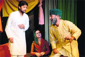 Artistes enact the Urdu comedy Nahi, Magar Haan at Natrang Studio in Jammu on Sunday. Written by Shaukat Thanvi, it was directed by Neeraj Kant.