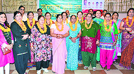 Newly joined members of the Uttarakhand Kranti Dal (P) at a programme in Dehradun on Sunday