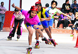Girls take part in the 19th Inter-School Roller Skating Competition at Doon Girls School in Dehradun on Sunday