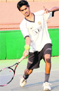 A player in action during the AITA-CLTA Tennis Tournament in Chandigarh on Monday. Tribune photo: Pradeep Tewari