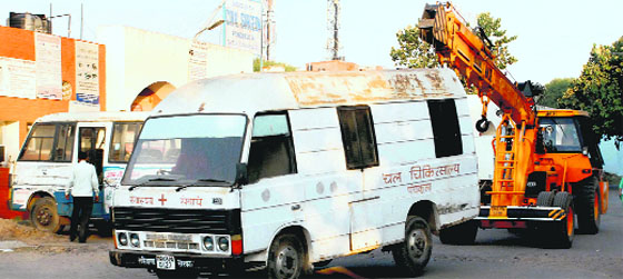 An ambulance being towed away at the General Hospital, Sector 6, Panchkula. Tribune photo: Nitin Mittal