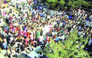 Villagers block the main road in Ateli town of Mahendragarh on Monday.
