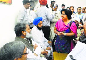 Health Minister Anil Vij hears out peoples grievances in Ambala Cantonment on Monday.