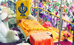 Devotees participate in Gurmat samagam at Digiana Ashram in Jammu. A Tribune photograph