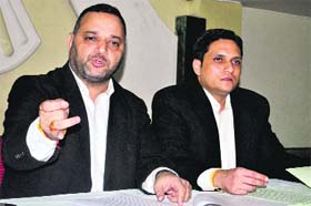 Sandeep Gorsi (left), an advocate and a Congress leader, along with Vaneet Mahajan addresses mediapersons in Amritsar