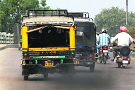 Autos emitting smoke of pollution being driven on a city road in Amritsar on Tuesday