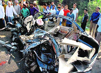 The mangled remains of the Honda City car that met with an accident near Dera Bassi on the Ambala-Chandigarh highway on Tuesday morning. 