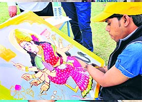 Gorakh Rajak from Patna participates in the silk painting competition during the 4th National Abilympics in Chandigarh on Tuesday. 