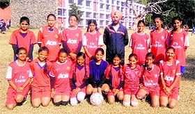 Eves of the GMSSS-22 in a jubilant mood after winning the Inter-School Football Championship for (U-14) Girls in Chandigarh on Tuesday. 