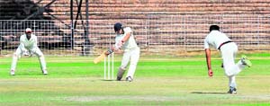 Players of AG Punjab and AG Haryana in action during a cricket match at Sector 16 in Chandigarh on Tuesday. 