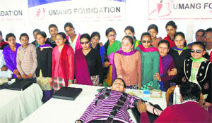 A visually impaired girl donates blood during a camp organised by the Umang Foundation in Shimla on Tuesday.