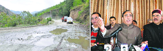 Vehicles move slowly on the Shimla- Rohru road; (right) Narender Bragta, vice-president, BJP, addresses mediapersons in Shimla on Tuesday.