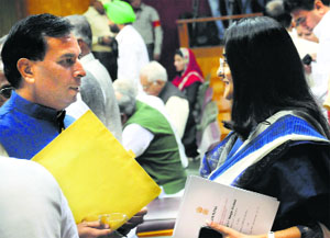 Finance Minister Capt Abhimanyu (left) and Congress leader Kiran Choudhry cross path