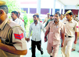 Police take the accused to court at Narnaul in Mahendragarh on Tuesday.