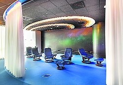 A 3D screen with ergonomic chairs is what makes this conference area at Cisco India office a favourite of employees