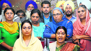 The family members of the Punjabi youths held captive by ISIS after a meeting with Union Ministers Sushma Swaraj and Harsimrat Kaur Badal in New Delhi on Tuesday.