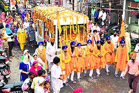 A procession being taken out to mark the birth anniversary of Guru Nanak Dev in Bathinda on Wednesday. 