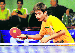 Mayank returns a shot during the 27th Chandigarh State Table Tennis Championship at Sector 23, Chandigarh, on Wednesday