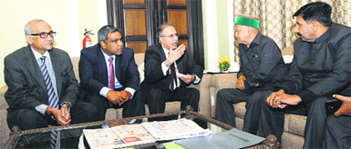 Chief Minister Virbhadra Singh interacts with representatives of the Tata group during investors meet in Mumbai on Wednesday.