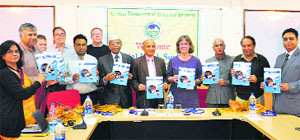 Prof Yoginder Singh Verma, Vice-Chancellor, Central University of Himachal Pradesh, releases the prospectus for admission to research degree programmes in Kangra.