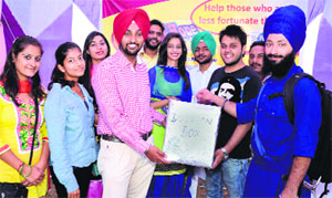 Students at the charity stall set up by the Social Workers Association at the Inter-College Youth Festival, PAU, in Ludhiana.