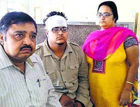 Victim Manjit Arora with his parents at the Bathinda Civil Hospital on Wednesday. 