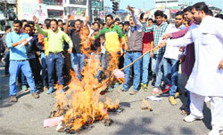 Members of the NSUI protest against the police at Estley Hall in Dehradun on Wednesday. Tribune photo: Abhyudaya Kotnala