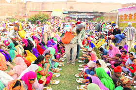 people partake langar on the occasion of Guru Nanak Devs birth anniversary at Gurdwara Qila Mubarak on Thursday.