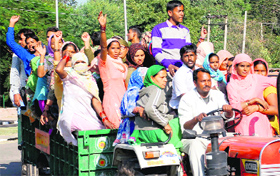 Protesting MC workers move towards the residence of Gian Chand Gupta, MLA, Panchkula, on Thursday.