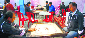 Participants at the northern carrom tournament, organised by the AG office, in Shimla on Thursday.
