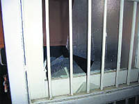 a smashed windowpane at the hospital
