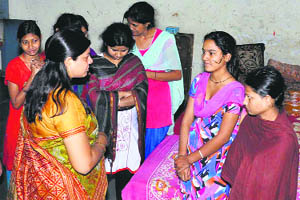 Cabinet Minister Kavita Jain talks to Nari Niketan inmates in Karnal on Thursday